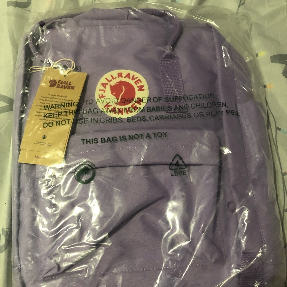 Never been opened, lavender fjallraven kanken bag